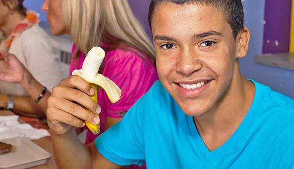 Kid eating banana