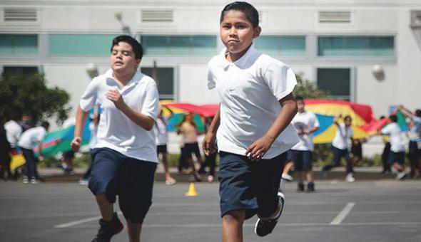 running boys on playground