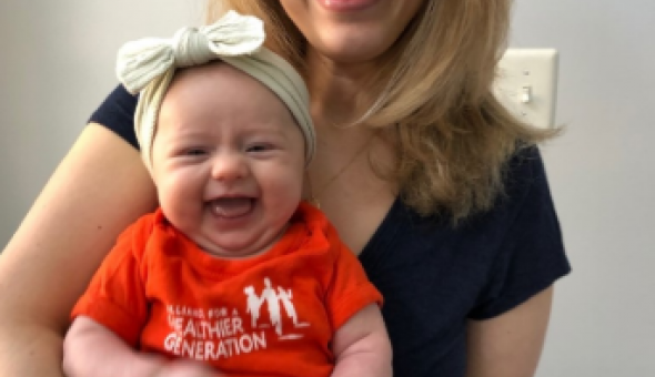 Stephanie w/ baby in HG onesie