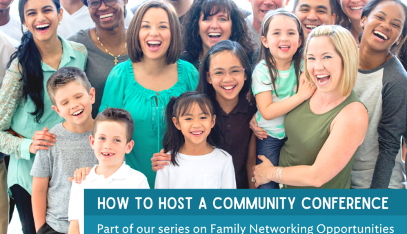 A diverse group of families with adults and children of many ages stand together in a group smiling