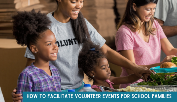 Two adults and two school-aged children volunteer at a food table. One adult is wearing a shirt that reads, "Volunteer."